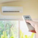 Hand hold remote control directed on the air conditioner